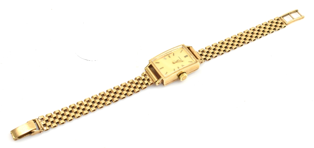 LONGINES; a lady's 9ct gold wristwatch, the rectangular dial set with batons, with 9ct gold strap, - Image 2 of 7