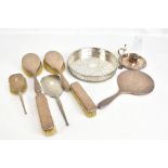 JS & CO; an Edward VII hallmarked silver five piece dressing table set comprising hand mirror, two
