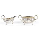 HORACE WOODWARD & CO LTD; a late Victorian hallmarked silver twin handled sugar bowl and jug, both