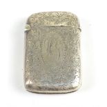 E. JACOBS & SONS; a Victorian hallmarked silver vesta case of rounded rectangular form, engraved