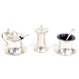 LEVI & SALAMAN; a George V hallmarked silver three piece cruet set of plain waisted form, complete