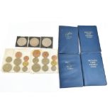 Three commemorative crowns, four sets of decimal coins, and two sets of pre-decimal coins.