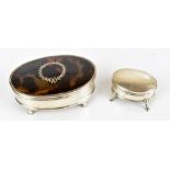 DEAKIN & FRANCIS; a George V hallmarked silver and faux tortoiseshell trestle table box of oval
