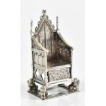 SAUNDERS & JAMES; an Edward VII hallmarked silver miniature throne chair, London 1902, height 5.6cm,