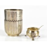 GOLDMSITHS & SILVERSMITHS CO LTD; an Edward VII hallmarked silver christening mug with fluted