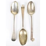 A George III hallmarked silver tablespoon, London 1770, and two further hallmarked silver