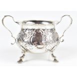 WALTER & JOHN BARNARD; a late Victorian hallmarked silver twin handled sugar bowl raised on four