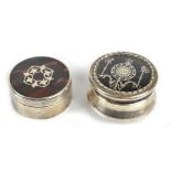 WILLIAM COMYNS; an Edwardian hallmarked silver and inlaid tortoiseshell circular pill box, the