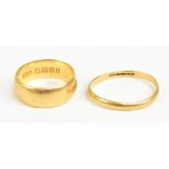 Two 22ct yellow gold wedding bands, largest size S, combined approx 9.7g (2).Additional