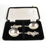 SAMUEL HARWOOD; a pair of Victorian hallmarked silver spoons with a Continental male and female