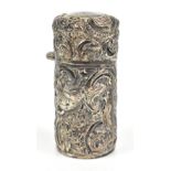 SAMSON & MORDAN & CO; a Victorian hallmarked silver scent bottle with repoussé decoration