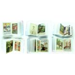 Two albums of postcards containing approximately two hundred comical cards, seaside, Christmas,