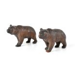 Two carved Black Forest style bears, length of each approx 9cm (2).