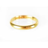 A 22ct gold band ring, size L, approx 3.1g.