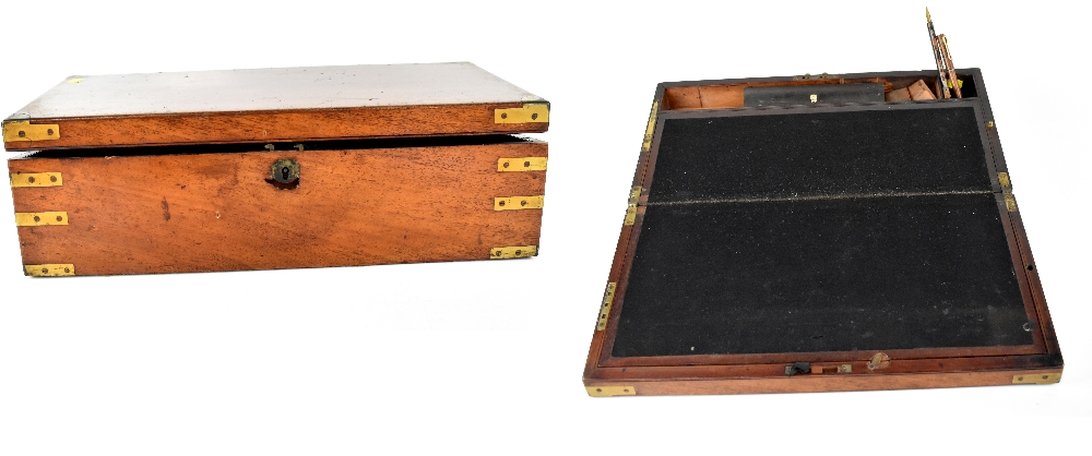 A 19th century brass-bound mahogany knee desk/writing slope with side drawer and internal