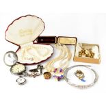 A quantity of various costume jewellery to include a Charnier gold plated ring, brooches,