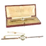 An Edwardian aquamarine and diamond long bar brooch,