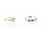 A diamond solitaire ring, small illusion-set diamond on 18ct gold and platinum shank, size K,