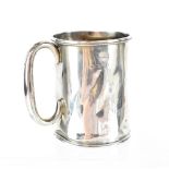 A Edward VII small hallmarked silver mug with simple beaded decoration to the top and bottom,