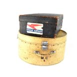 A vintage vellum travelling hat box with remnants of various shipping labels including 'Anchor Line