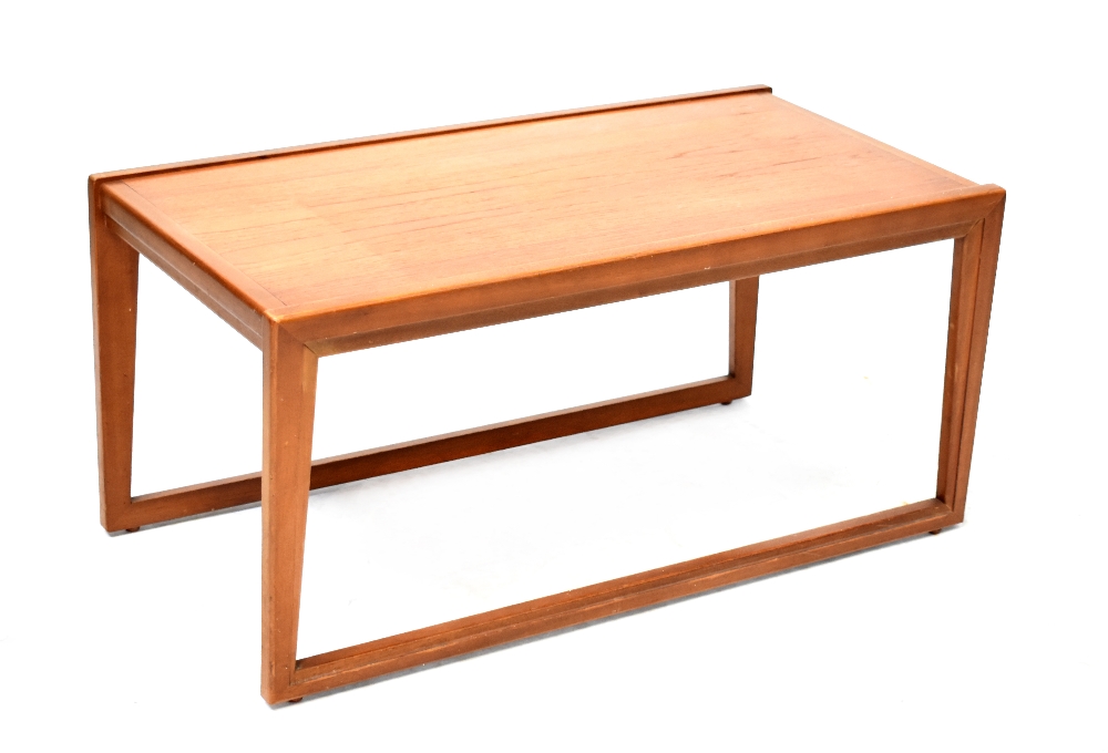A retro teak rectangular coffee table on rectangular framed support, 79 x 42cm.