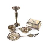 A small mixed lot of silver to include a loaded spill vase, marks rubbed,