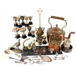 A large vintage copper kettle, small letter rack, brass Egyptian cat, a quantity of plated trophies,