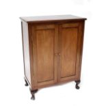 A mahogany two-door side cabinet raised on squat cabriole legs, width 73cm, height 100cm,