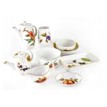 A quantity of Royal Worcester 'Evesham' pattern tableware and a further quantity of 'Wild Harvest'