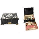 A 19th century papier mâché black lacquer mother of pearl inlaid and gilt-heightened sewing box,