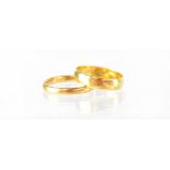 Two 22ct gold band rings (thin and wide), both size U/R, combined approx 7.5g (2).