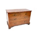 An inlaid mahogany low chest of two short over two long drawers, raised on ogee bracket feet,