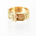 A gentlemen's large vintage 9ct gold ring of belt and buckle design, size Z+2, approx 12.6g.