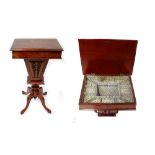 A Victorian burr walnut sewing table with hinged lid enclosing fitted interior above tapering