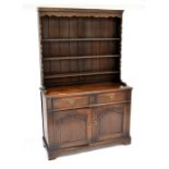 A reproduction oak dresser,