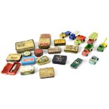 A collection of vintage tins, a small collection of vintage diecast cars,