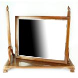 A Victorian-style mahogany swing toilet mirror with rectangular plate, on squat cabriole legs,