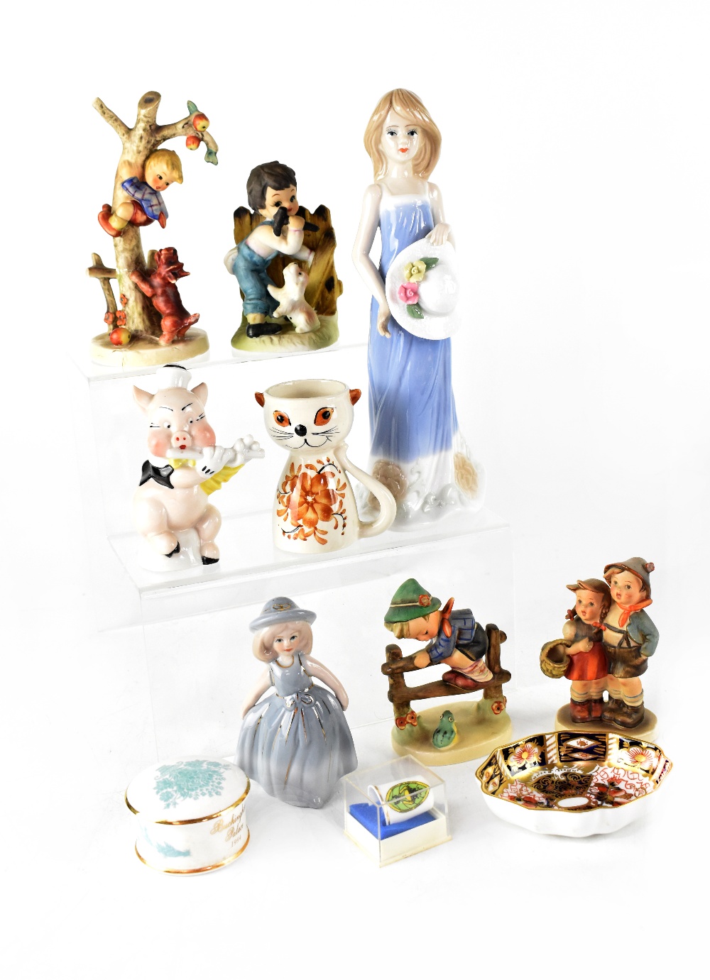 A small collection of ceramics to include four Hummel figures,