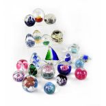 A collection of twenty-two paperweights to include six Caithness examples (22).