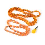 An amber necklace with various graduated amber pieces,
