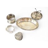 A small mixed lot of silver to include a pin dish, napkin rings, etc, various hallmarks,
