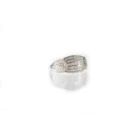 A 9ct white gold ring set with five rows of baguette-cut diamonds in diamond chip shoulders,