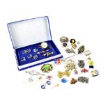 A small mixed lot of costume jewellery to include a 15ct gold and seed pearl brooch,