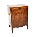 A George III mahogany cellarette with faux two-door panels to the front,