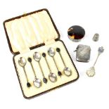 A cased set of six coffee bean spoons, a vesta case, a compact with faux tortoiseshell lid,