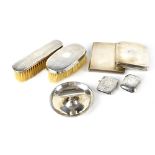 A small mixed lot of hallmarked silver to include two cigarette cases, two vesta cases,