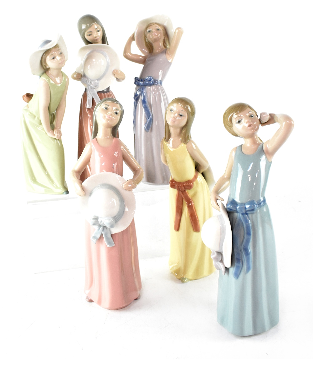 A set of six Lladró porcelain figures from the 'Girls with Hats and Bows' range comprising 'Prissy',