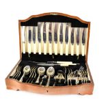 A cased set of cutlery to include knives, forks, spoons, teaspoons and carving set.