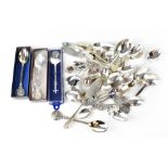 A quantity of various tourist enamel top collectors' spoons including ten silver hallmarked
