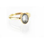 An aquamarine and 18ct gold dress ring, size K, approx 2.2g.